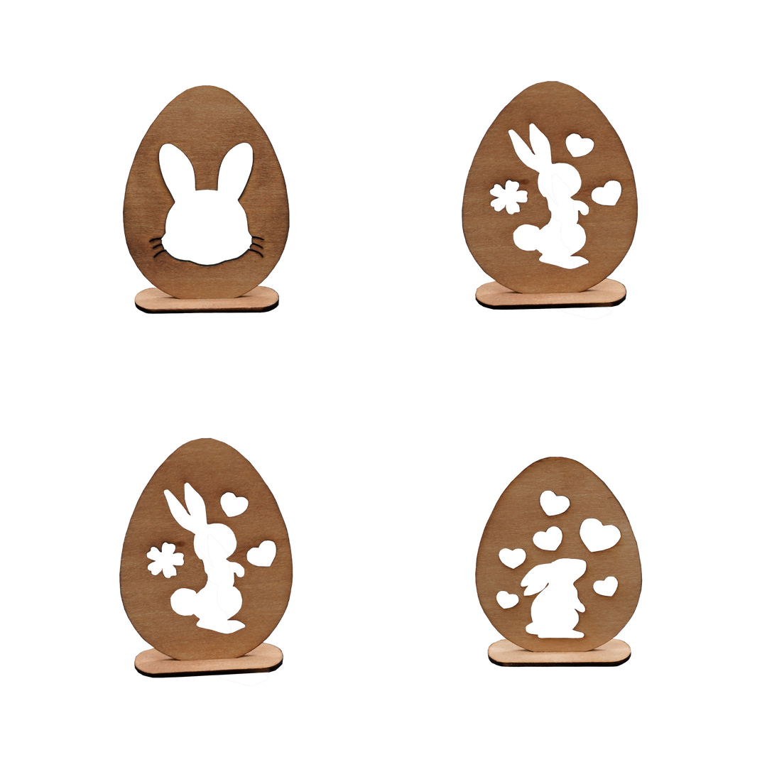 Flache Holzostereier mit ausgestanzten Hasenmustern zum aufstellen.